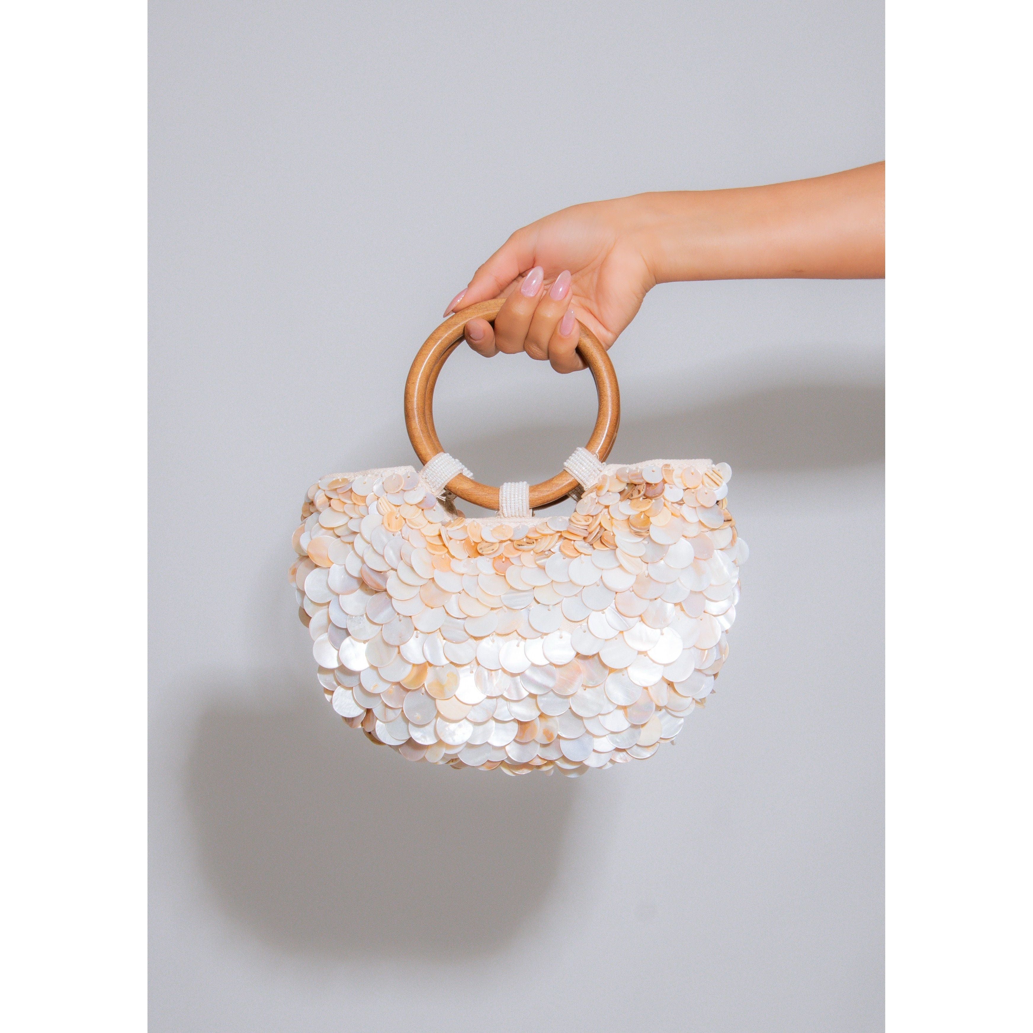 White mini disc beaded handbag with wooden handle