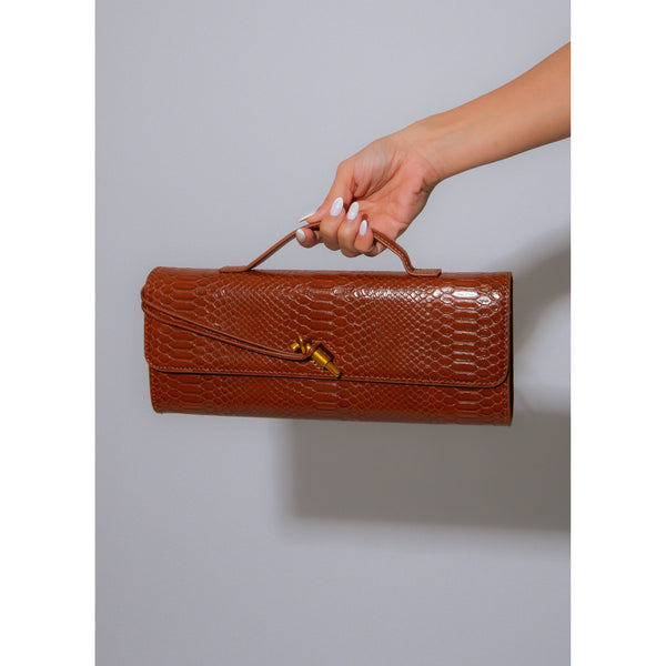 BROWN TEXTURED CLUTCH WITH HANDLE AND GOLD LOOP CLOSURE 