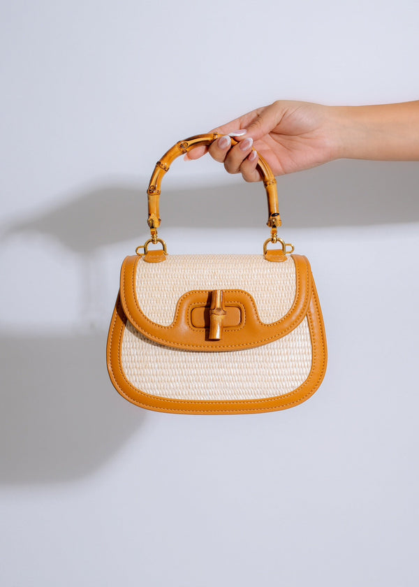 Vintage Summers Bamboo Handle Mini Handbag BROWNSimplyDerri
Our Vintage Summers Bamboo Handle Mini Handbag is designed with elegance in mind. The chic naturally woven straw hue is complemented by the bamboo handle &amp; clasACCESSORIESVintage Summers Bamboo Handle Mini Handbag BROWN
