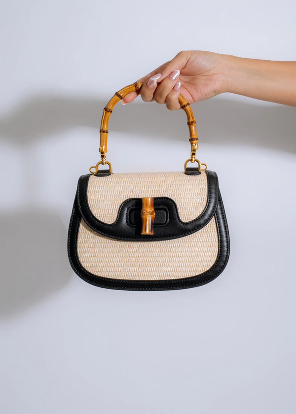 STARW WOVEN MINI BAG WITH BAMBOO HANDLE WITH BLACK FAUX LEATHER PIPING AND CROSSBODY STRAP  