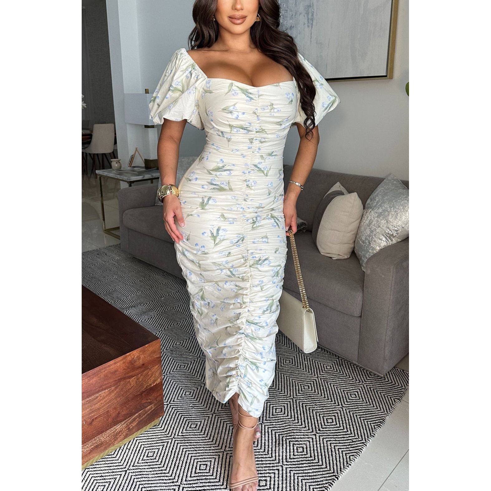 Cream midi dress with a romantic vintage blue floral printed design, featuring refined ruching