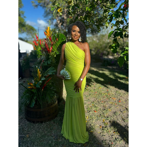 One shoulder lime green intricate ruched draping gown designed to sculpt and flatter every curve with cascading trumpette bottom. 